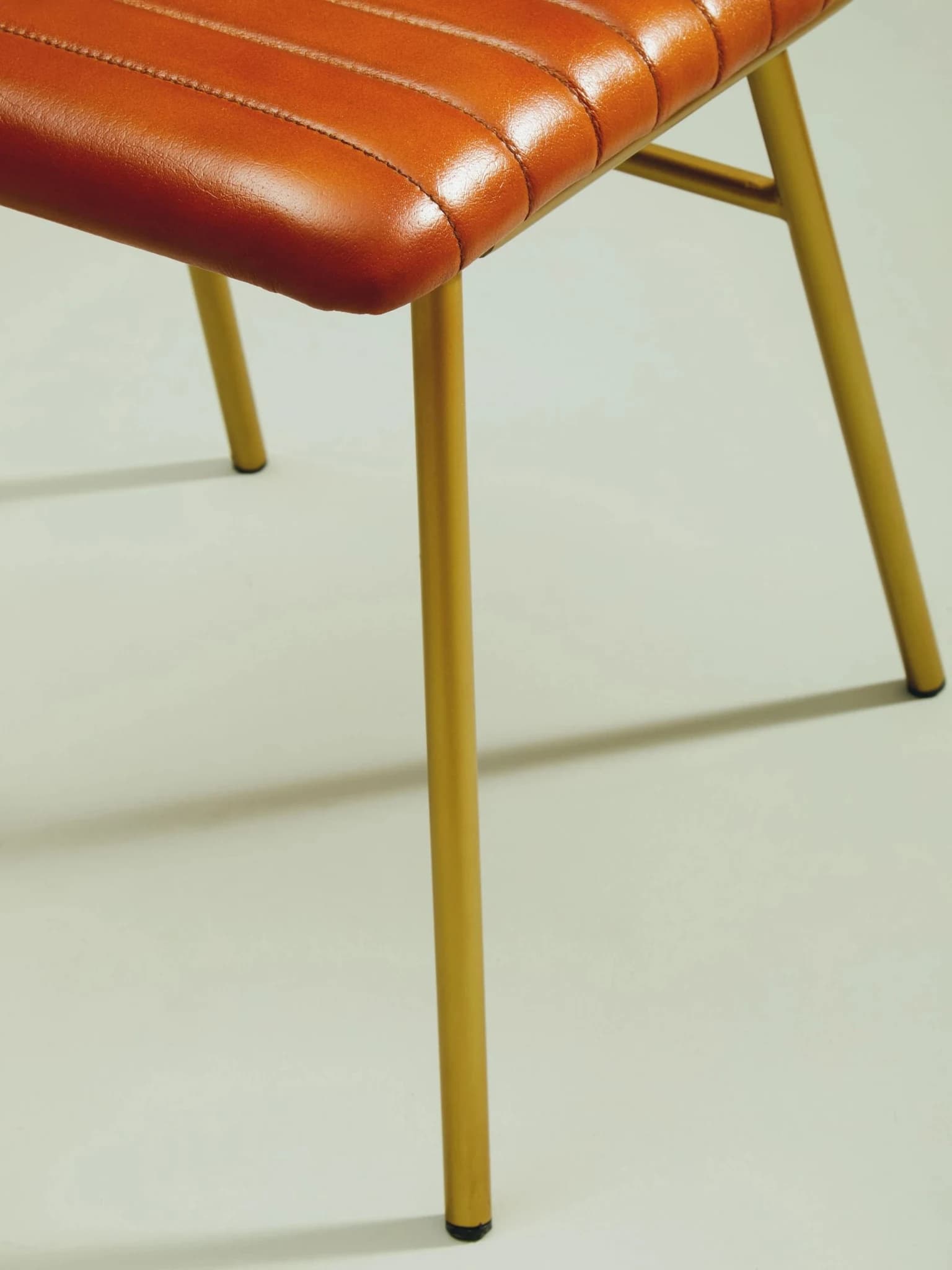 Buffalo Tan Leather Dining Chair With Gold Finish Frame - Seating, photo 3 of 8