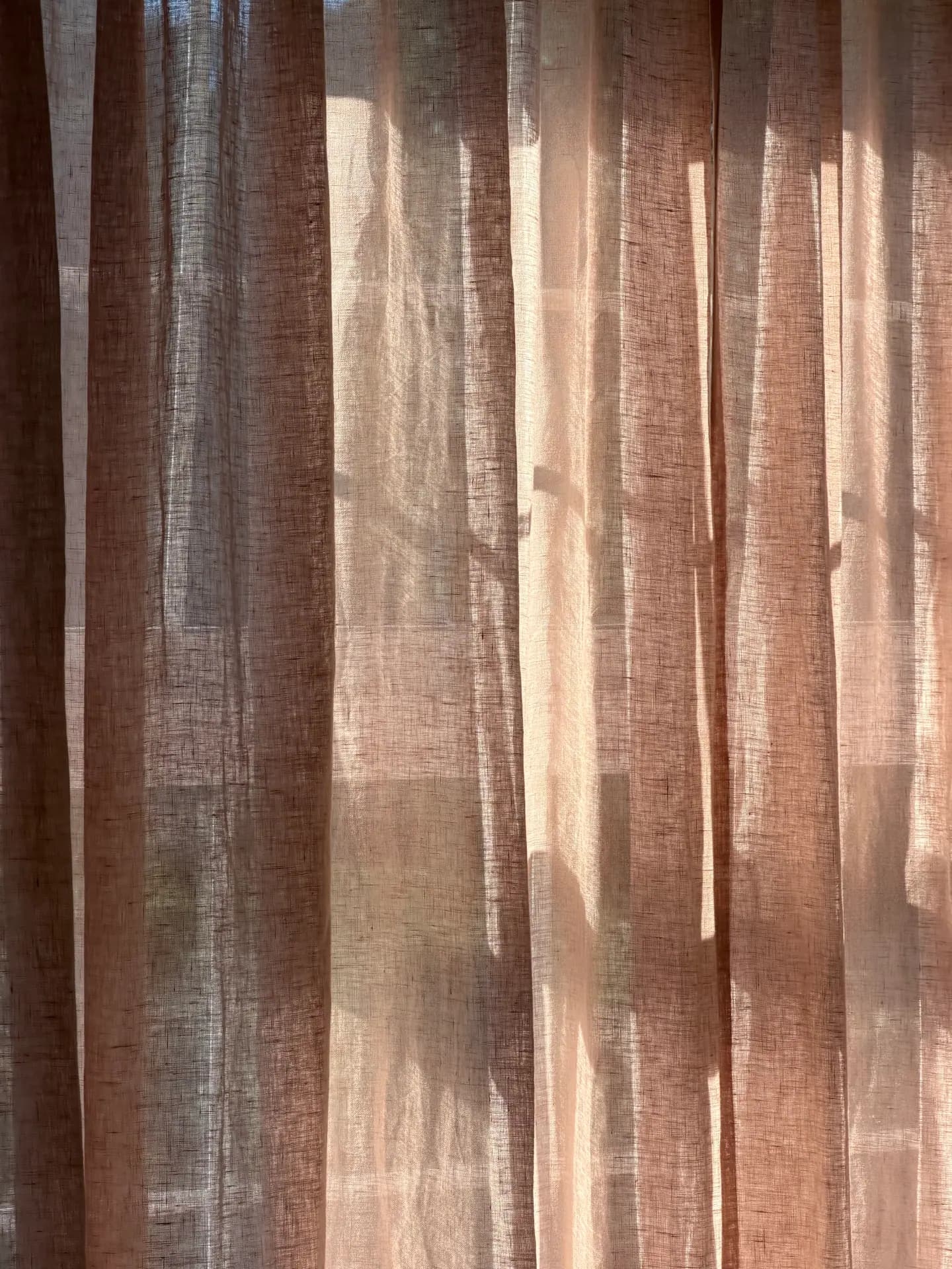 Sheer dusty-rose curtains