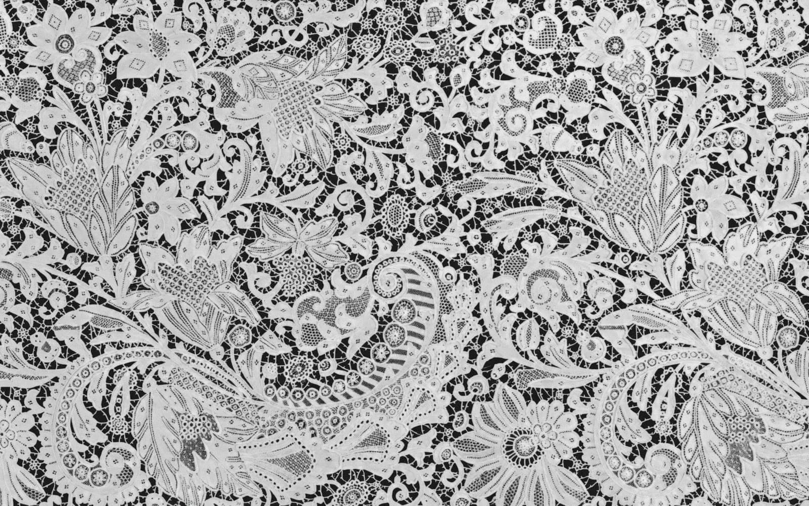 Floral lace and damask-style woven fabric