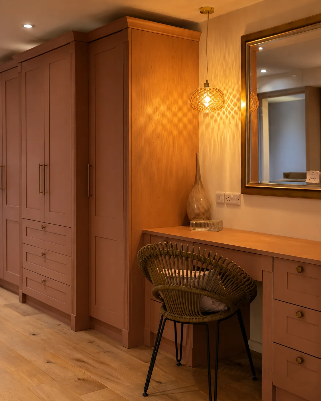 Fitted bedroom wardrobes with a dressing table