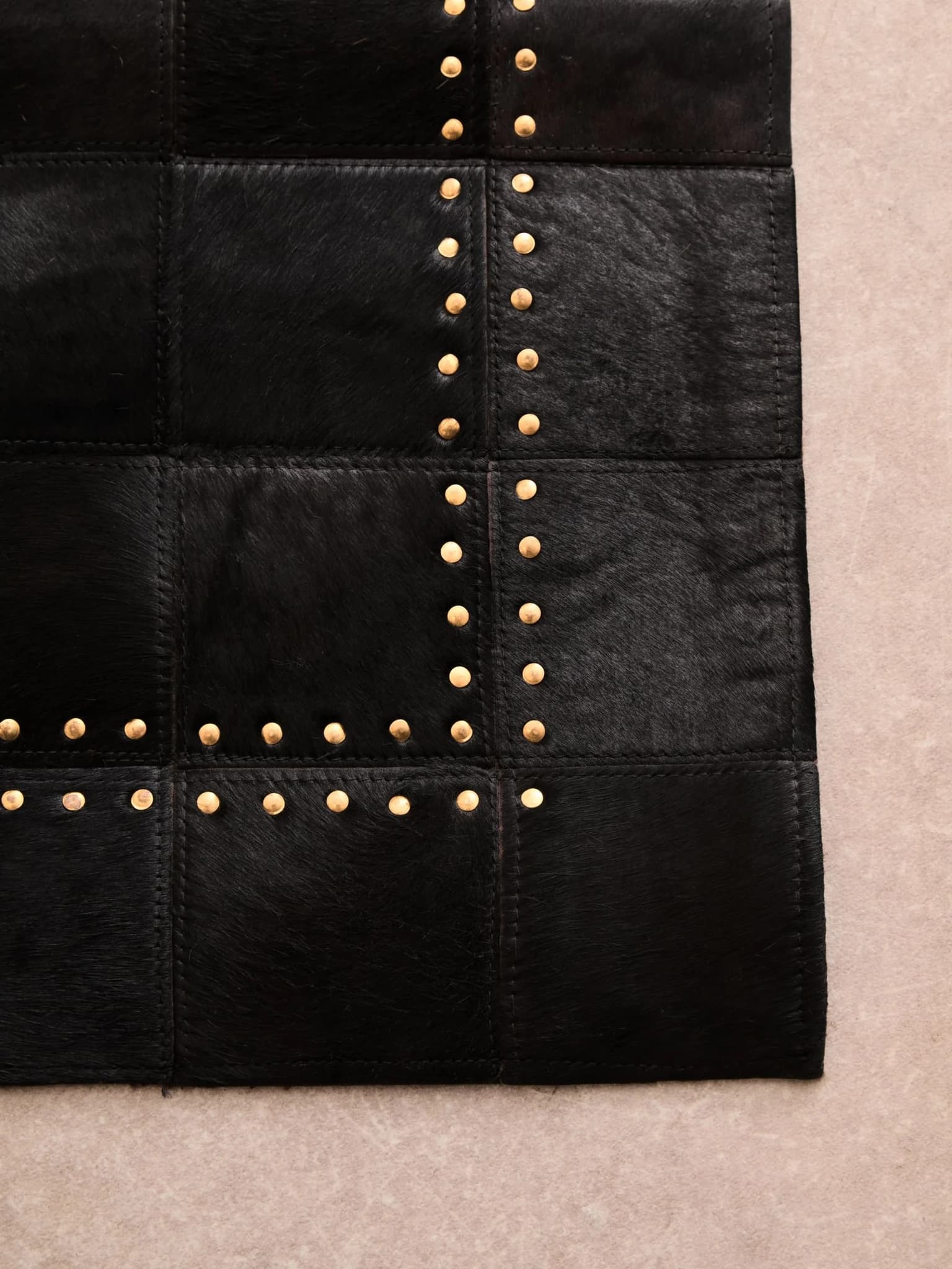 Bosie Safira Small Black hair on leather Patchwork Rug With Gold Studs - Decorative, photo 2 of 8