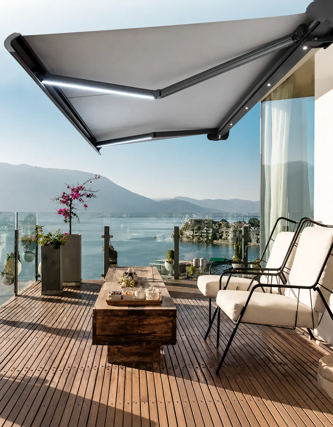Patio folding arm awning over outdoor seating