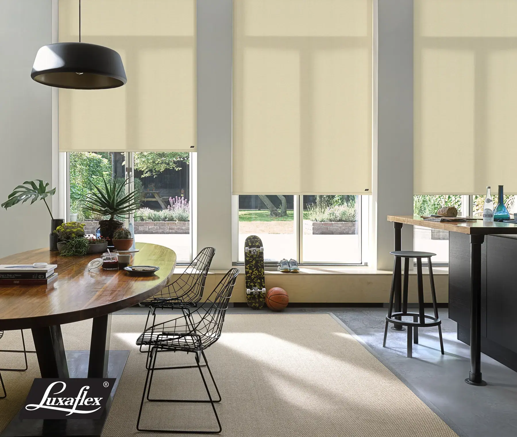 Luxaflex roller blinds in a bedroom