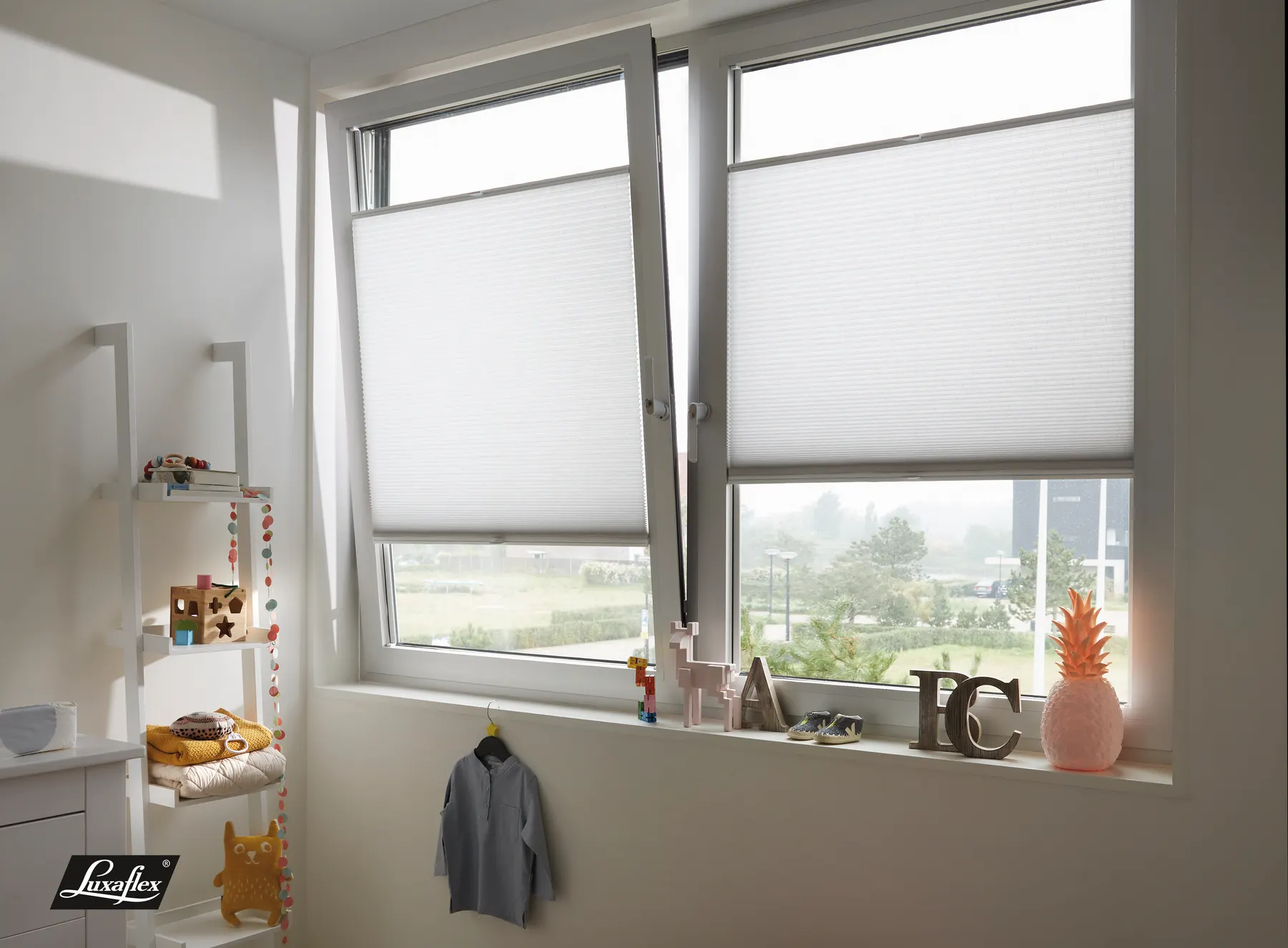 Luxaflex honeycomb duet blinds fitted into tilt-and-turn windows