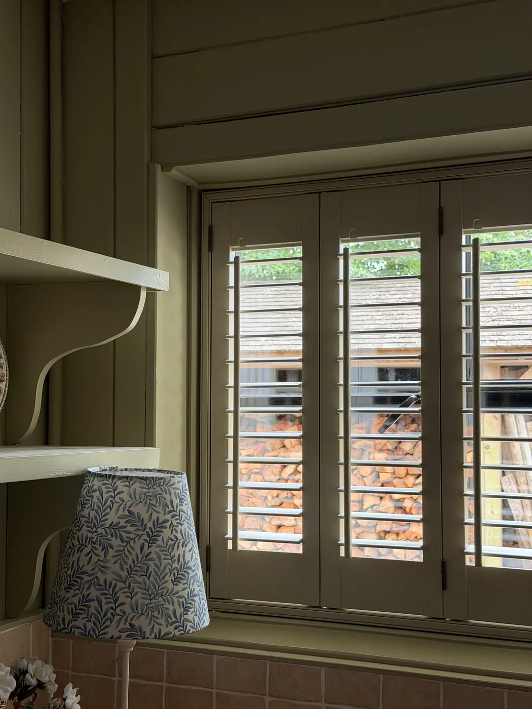 White S:CRAFT shutters fitted in a living room by Crestwood of Lymington
